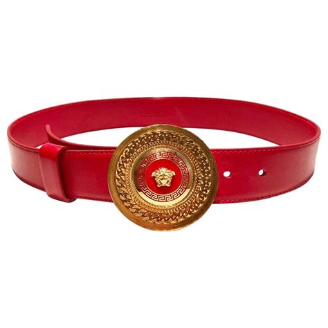 red versace belt gold buckle.